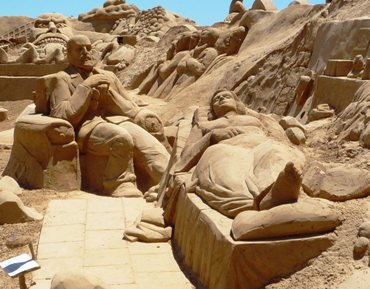 Just a cool photo taken at the July 2009 7th Annual International Sand Sculpture Festival in Portugal ... the theme was "Discoveries".  This photo of the sand sculpture of Sigmund Freud having a session with a patient was taken by photographer Roger Haworth.  It is used courtesy of Mr. Haworth and the GNU Free Documentation License 1.2. (http://commons.wikimedia.org/wiki/File:FIESA_7_Freud_276.jpg)